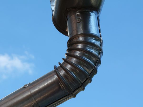 Metal Downspout Installation in Wilson