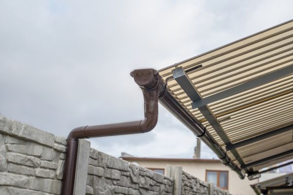 Plastic Downspout Installation in Wilson